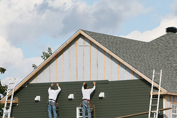 Professional Siding technician working in East Berlin, PA